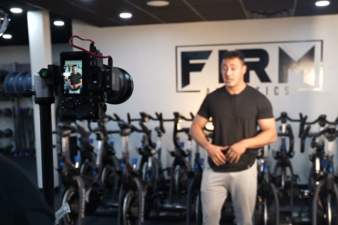 One shoot day — the cinema rig rolling on a Firm Athletics set